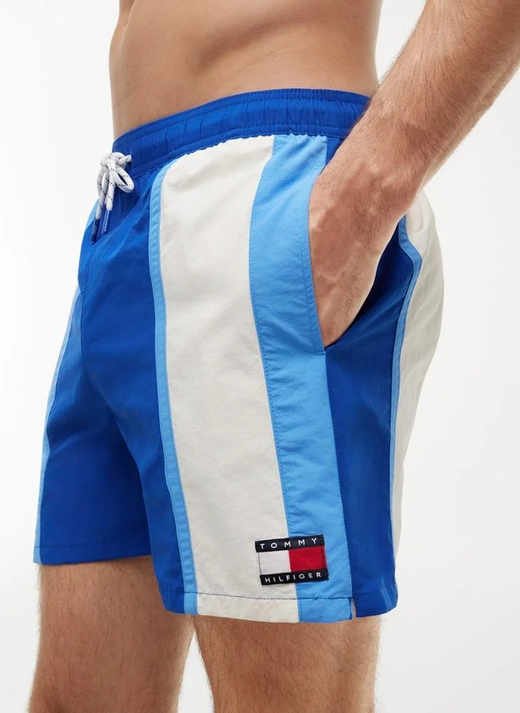 TOMMY HILFIGER  Heritage Colour-Blocked Mid Length Swim Shorts for Men | Best Price UAE